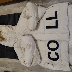 Cream Hooded Puffer Coat with Black Lettering